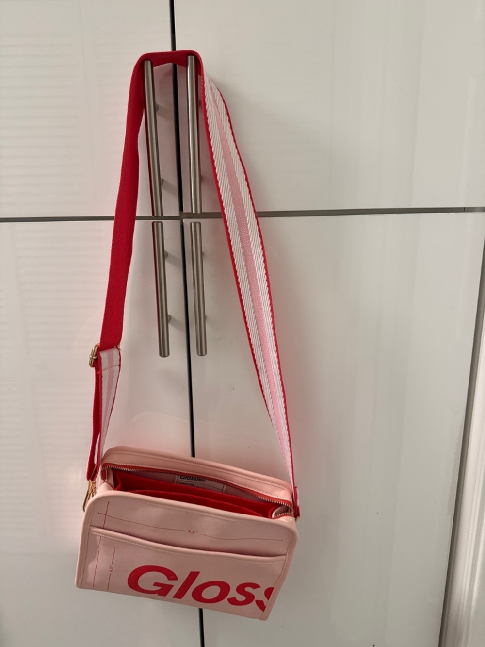 Glossier Pink Crossbody Bag with Red Strap